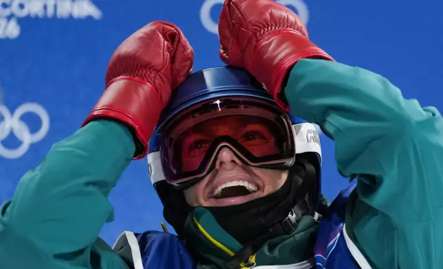 Australia's Scotty James reacts during the men's snowboarding halfpipe finals at the 2026 Winter Olympics, in Livigno, Italy, Friday, Feb. 13, 2026. (AP Photo/Abbie Parr)