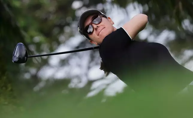 Hannah Green of Australia tees off during the HSBC Women's World Championship at Sentosa Golf Club in Singapore, Thursday, Feb. 26, 2026. (AP Photo/Suhaimi Abdullah)