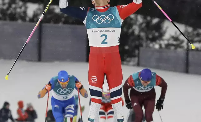 FILE - Johannes Hoesflot Klaebo, of Norway, celebrates after winning the men's cross-country skiing sprint classic at the 2018 Winter Olympics in Pyeongchang, South Korea, Feb. 13, 2018. (AP Photo/Kirsty Wigglesworth, File)