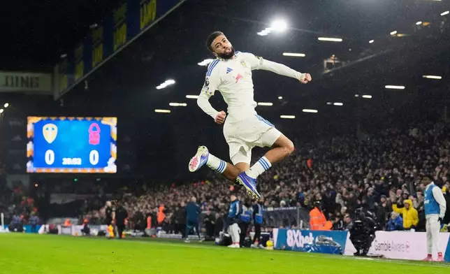 Leeds United's Jayden Bogle celebrates scoring their first goal during the English Premier League soccer match between Leeds United and Nottingham Forest in Leeds, England, Friday Feb. 6, 2026. (Danny Lawson/PA via AP)