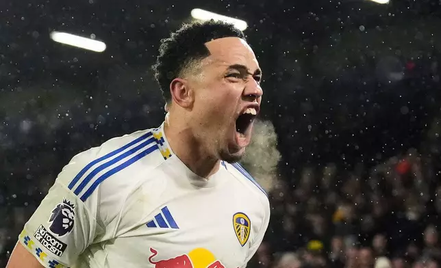Leeds United's Noah Okafor celebrates scoring their second goal during the English Premier League soccer match between Leeds United and Nottingham Forest in Leeds, England, Friday Feb. 6, 2026. (Danny Lawson/PA via AP)