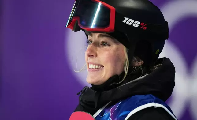 New Zealand's Zoi Sadowski-Synnott looks on during the women's snowboard big air qualifications at the 2026 Winter Olympics, in Livigno, Italy, Sunday, Feb. 8, 2026. (AP Photo/Gregory Bull)