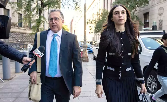 FILE - Attorney Marc Agnifilo, left, and Teny Geragos, right, for Sean "Diddy Combs, arrive at Manhattan federal court, Oct. 10, 2024, in New York. (AP Photo/Yuki Iwamura, File)