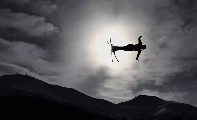 Czechia's Adela Merkova (22) competes during the women's freestyle skiing aerials qualifications at the 2026 Winter Olympics, in Livigno, Italy, Wednesday, Feb. 18, 2026. (AP Photo/Gabriele Facciotti)