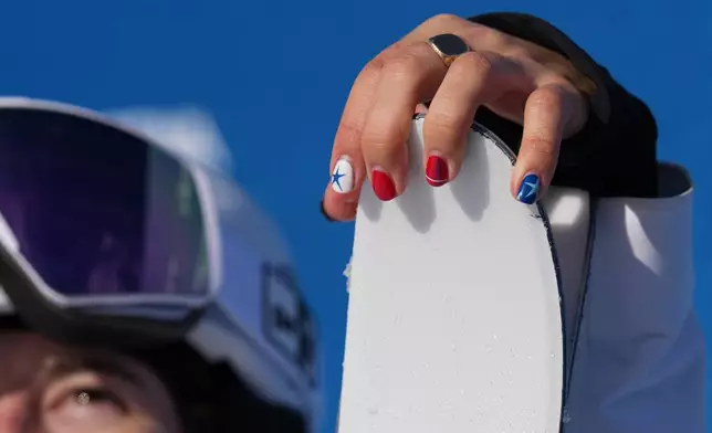 United States' Jaelin Kauf waits for her score during the women's freestyle skiing moguls finals at the 2026 Winter Olympics, in Livigno, Italy, Wednesday, Feb. 11, 2026. (AP Photo/Gregory Bull)