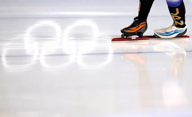 Shomu Sasaki of Japan warms up prior to competing in the men's 5,000 meters speedskating race at the 2026 Winter Olympics, in Milan, Italy, Sunday, Feb. 8, 2026. (AP Photo/Luca Bruno)