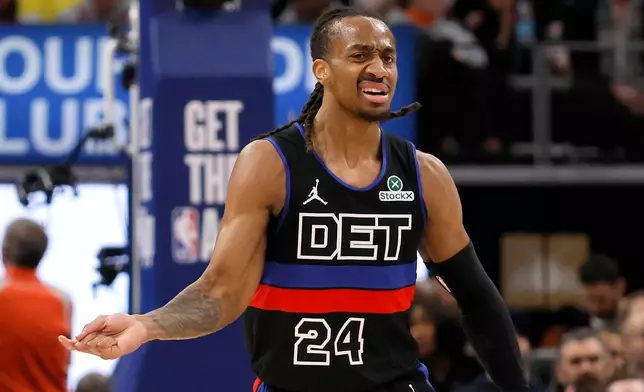 Detroit Pistons guard Daniss Jenkins (24) celebrates after scoring against the New York Knicks during the second half of an NBA basketball game Friday, Feb. 6, 2026, in Detroit. (AP Photo/Duane Burleson)