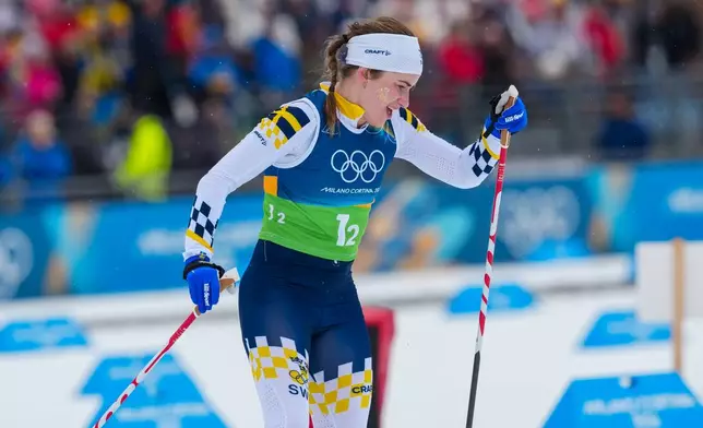 Ebba Andersson, of Sweden, competes in the cross country skiing women's 4 x 7.5km relay at the 2026 Winter Olympics, in Tesero, Italy, Saturday, Feb. 14, 2026. (AP Photo/Kirsty Wigglesworth)