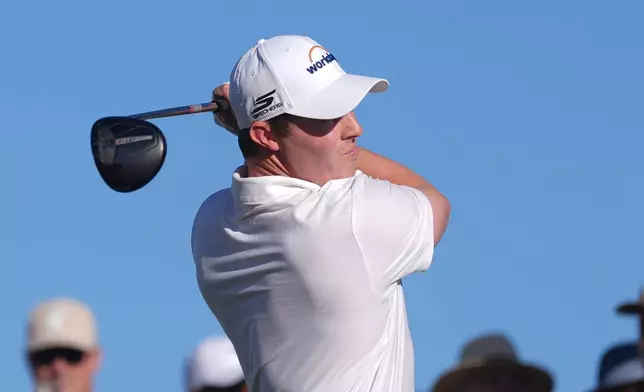 Matt Fitzpatrick, of England, hits his tee shot at the 15th hole during the first round of the Phoenix Open golf tournament at the TPC Scottsdale Stadium Course Thursday, Feb. 5, 2026, in Scottsdale, Ariz. (AP Photo/Ross D. Franklin)