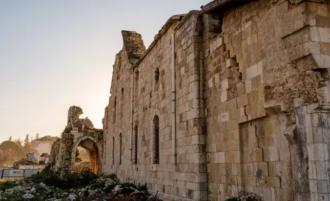 The ruins of St. Paul's Greek Orthodox Church, heavily damaged in the February 2023 earthquake, are seen in Antakya, southern Turkey, Wednesday, Feb. 4, 2026. (AP Photo/Murat Kocabas)
