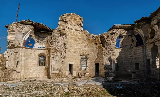 The ruins of St. Paul's Greek Orthodox Church, heavily damaged in the February 2023 earthquake, are seen in Antakya, southern Turkey, Wednesday, Feb. 4, 2026. (AP Photo/Murat Kocabas)