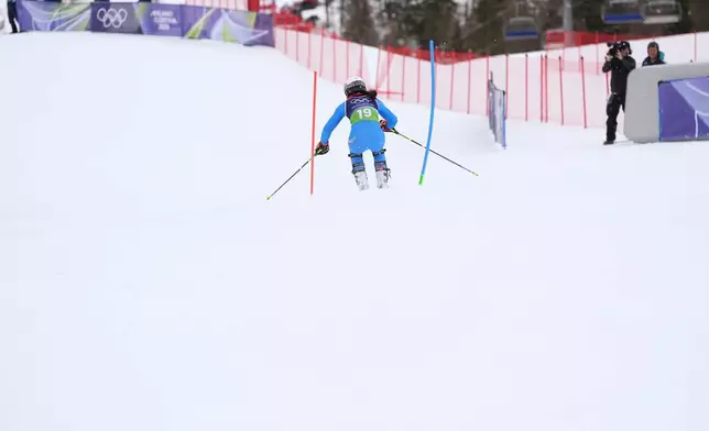 Italy's Giada d'Antonio competes in an alpine ski, women's slalom portion of a team combined race, at the 2026 Winter Olympics, in Cortina d'Ampezzo, Italy, Tuesday, Feb. 10, 2026. (AP Photo/Jacquelyn Martin)