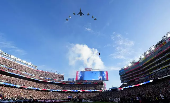 Planes fly in formation over Levi's Stadium before the NFL Super Bowl 60 football game between the New England Patriots and the Seattle Seahawks, Sunday, Feb. 8, 2026, in Santa Clara, Calif. (AP Photo/Julio Cortez)