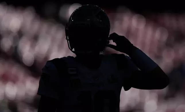 New England Patriots quarterback Drake Maye warms up before the NFL Super Bowl 60 football game against the Seattle Seahawks, Sunday, Feb. 8, 2026, in Santa Clara, Calif. (AP Photo/Matt Slocum)