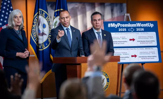 FILE - From left, Rep. Katherine Clark, D-Mass., the House minority whip, House Minority Leader Hakeem Jeffries, D-N.Y., and Rep. Pete Aguilar, D-Calif., chair of the Democratic Caucus, speak during a news conference about health care at the Capitol in Washington, Oct. 22, 2025. (AP Photo/J. Scott Applewhite, File)