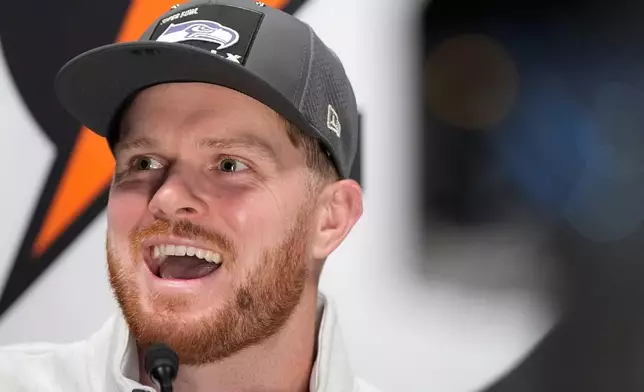 Seattle Seahawks quarterback Sam Darnold speaks during the NFL Super Bowl Opening Night, Monday, Feb. 2, 2026, in San Jose, Calif. ahead of the Super Bowl 60 football game between the New England Patriots and the Seattle Seahawks. (AP Photo/Brynn Anderson)