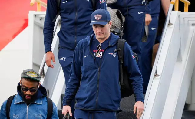 New England Patriots quarterback Drake Maye arrives, Sunday, Feb. 1, 2026, in San Jose, Calif. ahead of the Super Bowl 60 football game between the New England Patriots and the Seattle Seahawks. (AP Photo/Brynn Anderson)