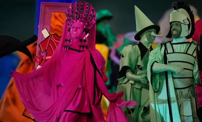 Dancers perform during the Olympic opening ceremony at the 2026 Winter Olympics, in Milan, Italy, Friday, Feb. 6, 2026. (AP Photo/Ashley Landis)