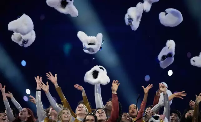 Dancers perform during the Olympic opening ceremony at the 2026 Winter Olympics, in Milan, Italy, Friday, Feb. 6, 2026. (AP Photo/Natacha Pisarenko)