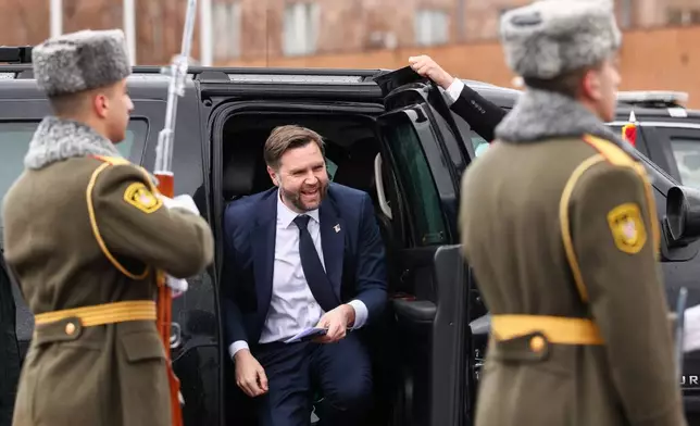 U.S. Vice President J.D. Vance gets out of a car before boarding Air Force Two upon departure for Azerbaijan, at Zvartnots International Airport in Yerevan, Armenia, Tuesday Feb. 10, 2026. (Kevin Lamarque/Pool Photo via AP)