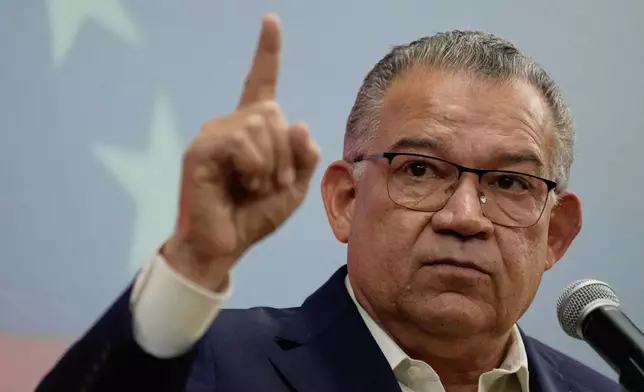 Venezuelan opposition politician Enrique Marquez speaks to the press in Caracas, Venezuela, Friday, Feb. 27, 2026. (AP Photo/Ariana Cubillos)