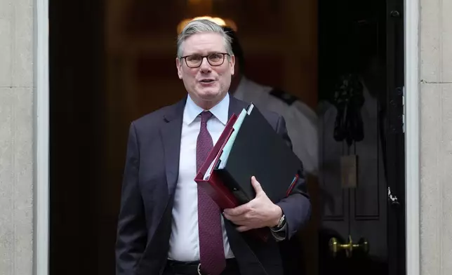 Britain's Prime Minster Keir Starmer departs 10 Downing Street to go to the House of Commons for his weekly Prime Minister's Questions in London, Wednesday, Feb. 4, 2026. (AP Photo/Alastair Grant)
