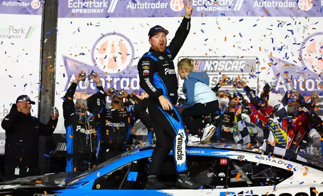 Tyler Reddick reacts after winning a NASCAR Cup Series auto race, Sunday, Feb. 22, 2026, in Hampton, Ga. (AP Photo/Colin Hubbard)