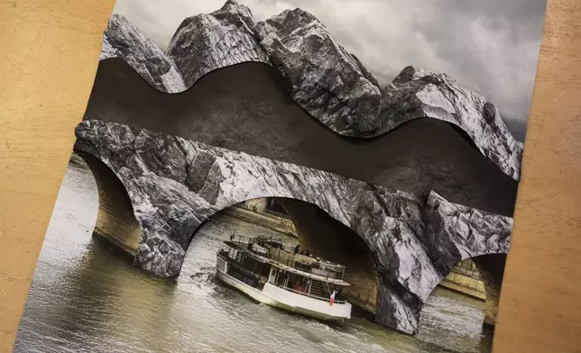 A photomontage shows the project by French artist JR called Pont Neuf Cavern in his studio, in Paris, France, Tuesday, Feb. 17, 2026. (AP Photo/Thibault Camus)
