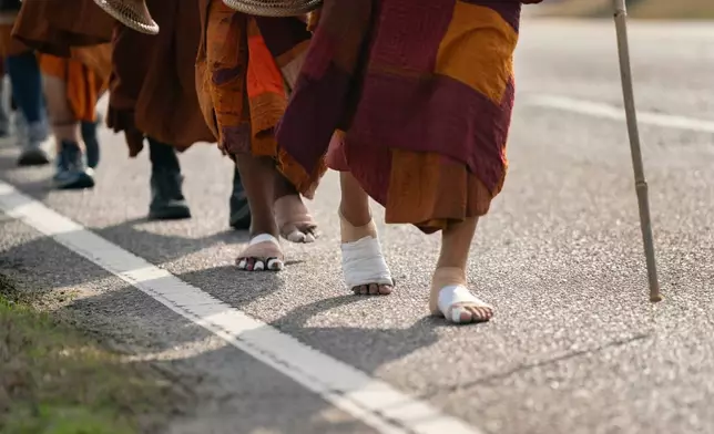 FILE - Bhikkhu Pannakara leads other buddhist monks in the, "Walk For Peace," in Saluda, S.C., Jan. 8, 2026. (AP Photo/Allison Joyce, File)