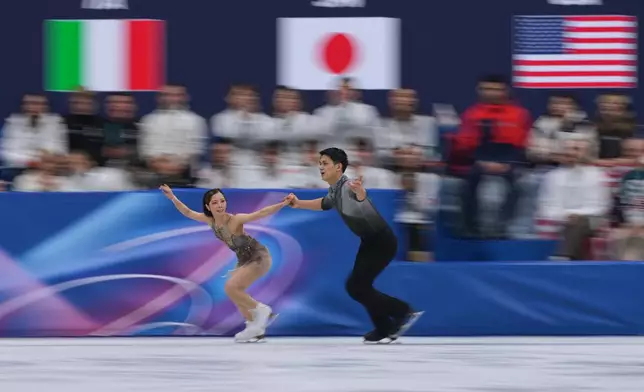 Riku Miura and Ryuichi Kihara of Japan compete during the figure skating pairs team event at the 2026 Winter Olympics, in Milan, Italy, Sunday, Feb. 8, 2026. (AP Photo/Stephanie Scarbrough)
