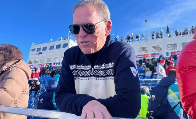 United States' Lindsey Vonn's father Alan Kildow is interviewed ahead of an alpine ski women's downhill race, at the 2026 Winter Olympics, in Cortina d'Ampezzo, Italy, Sunday, Feb. 8, 2026. (AP Photo/Andrew Dampf)