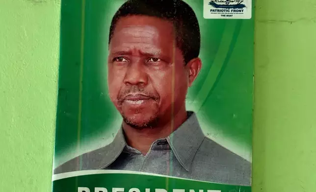 A portrait of former Zambian President Edgar Lungu, who died more than eight months ago in South Africa, is displayed on a wall in Lusaka, Zambia, Thursday, Feb.12, 2026. (AP Photo/Rodney Muhumuza)