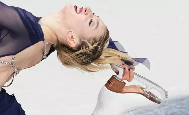 Amber Glenn of the United States competes during the women's figure skating free program at the 2026 Winter Olympics, in Milan, Italy, Thursday, Feb. 19, 2026. (AP Photo/Francisco Seco)