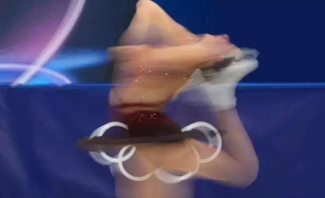 Lorine Schild of France competes during the women's figure skating free program at the 2026 Winter Olympics, in Milan, Italy, Thursday, Feb. 19, 2026. (AP Photo/Natacha Pisarenko)