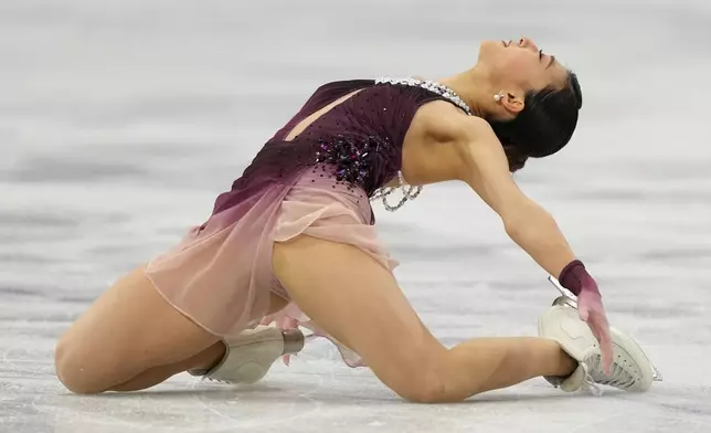 Kaori Sakamoto of Japan competes during the women's figure skating free program at the 2026 Winter Olympics, in Milan, Italy, Thursday, Feb. 19, 2026. (AP Photo/Stephanie Scarbrough)