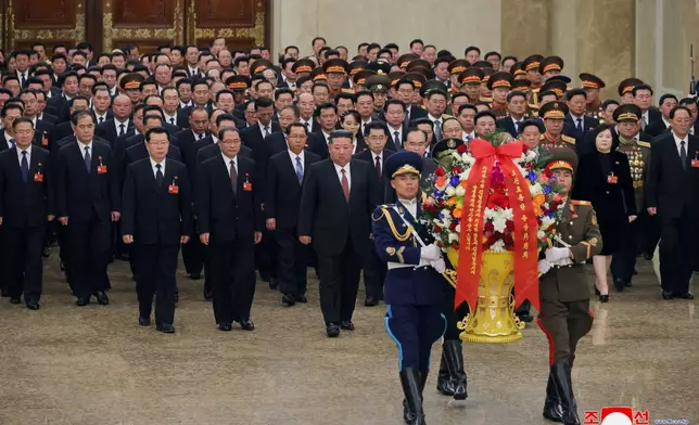 In this photo provided by the North Korean government, its leader Kim Jong Un visits Kumsusan Palace of the Sun with members for the Workers’ Party congress, in Pyongyang, North Korea, Thursday, Feb. 26, 2026. Independent journalists were not given access to cover the event depicted in this image distributed by the North Korean government. The content of this image is as provided and cannot be independently verified. Korean language watermark on image as provided by source reads: "KCNA" which is the abbreviation for Korean Central News Agency. (Korean Central News Agency/Korea News Service via AP)