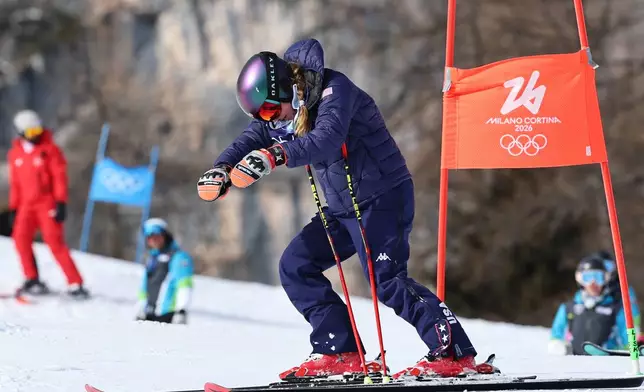 United States' Mikaela Shiffrin visualizes the course ahead of the second run of an alpine ski, women's giant slalom race, at the 2026 Winter Olympics, in Cortina d'Ampezzo, Italy, Sunday, Feb. 15, 2026. (AP Photo/Marco Trovati)