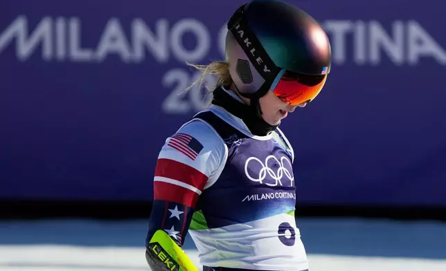 United States' Mikaela Shiffrin at the finish area of an alpine ski, women's giant slalom race, at the 2026 Winter Olympics, in Cortina d'Ampezzo, Italy, Sunday, Feb. 15, 2026. (AP Photo/Andy Wong)