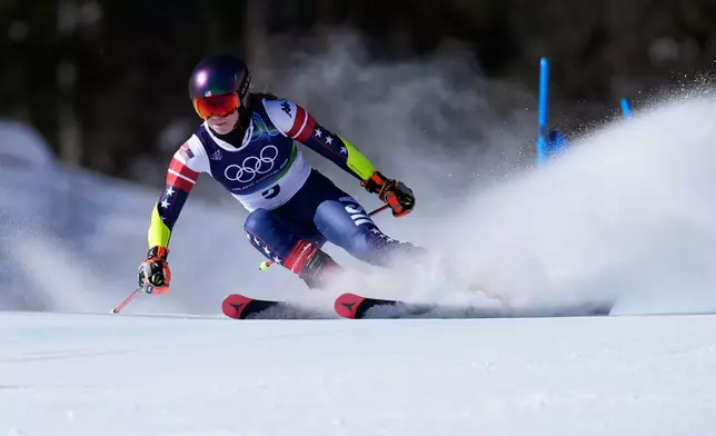 United States' Mikaela Shiffrin speeds down the course, during an alpine ski, women's giant slalom race, at the 2026 Winter Olympics, in Cortina d'Ampezzo, Italy, Sunday, Feb. 15, 2026. (AP Photo/Robert F. Bukaty)