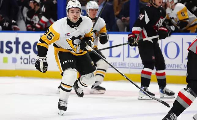 Pittsburgh Penguins forward Avery Hayes (85) skates up ice during the first period of an NHL hockey game against the Buffalo Sabres, Thursday, Feb. 5, 2026, in Buffalo, N.Y. (AP Photo/Jeffrey T. Barnes)
