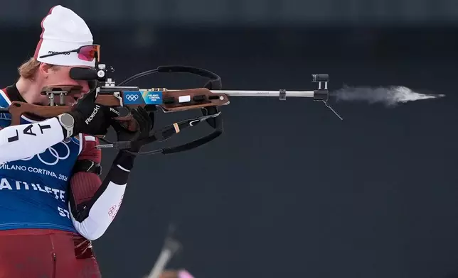Renars Birkentals, of Latvia, participates in a biathlon training session at the 2026 Winter Olympics in Anterselva, Italy, Saturday, Feb. 7, 2026. (AP Photo/Mosa'ab Elshamy)