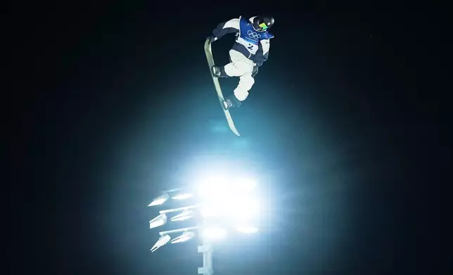 Japan's Ryoma Kimata competes during the men's snowboarding big air finals at the 2026 Winter Olympics, in Livigno, Italy, Saturday, Feb. 7, 2026. (AP Photo/Gregory Bull)
