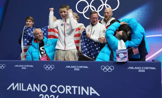 Alysa Lui of the United States reacts to her scores after competing during the figure skating women's team event at the 2026 Winter Olympics, in Milan, Italy, Friday, Feb. 6, 2026. (AP Photo/Stephanie Scarbrough)