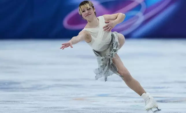 Alysa Lui of the United States competes during the figure skating women's team event at the 2026 Winter Olympics, in Milan, Italy, Friday, Feb. 6, 2026. (AP Photo/Stephanie Scarbrough)