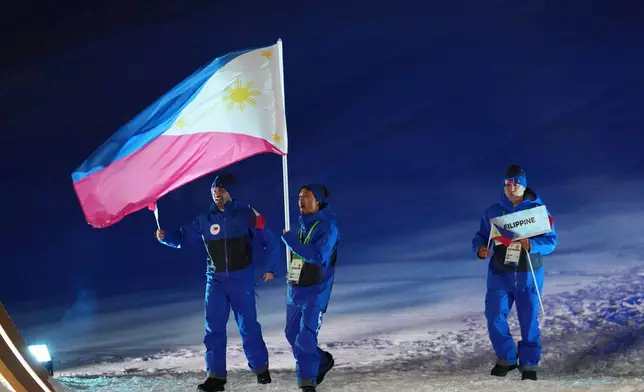 Athletes from the Philippines walk during the Olympic opening ceremony at the 2026 Winter Olympics, in Livigno, Italy, Friday, Feb. 6, 2026. (AP Photo/Abbie Parr)