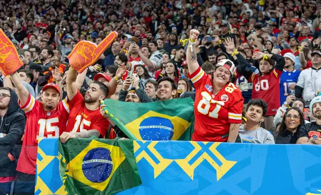 FILE - Kansas City Chiefs fans cheer against the Los Angeles Chargers in an NFL football game, Sept. 5, 2025, in São Paulo, Brazil. (AP Photo/Jeff Lewis, File)