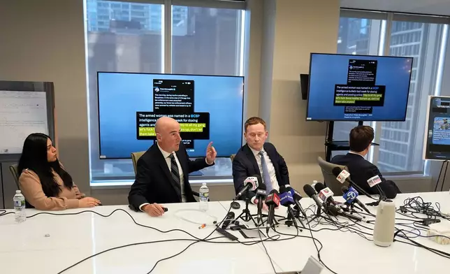 Marimar Martinez, left, a woman who was shot by a Border Patrol agent last year, sits with her attorneys during a press conference Wednesday, Feb. 11, 2026, in Chicago. (AP Photo/Erin Hooley)