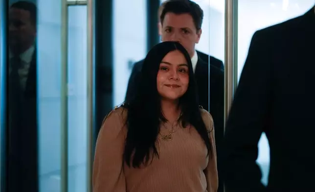 Marimar Martinez, a woman who was shot by a Border Patrol agent last year, arrives with her attorneys during a press conference Wednesday, Feb. 11, 2026, in Chicago. (AP Photo/Erin Hooley)