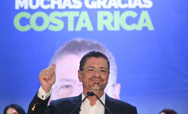 FILE - Costa Rica's former finance minister Rodrigo Chaves speaks to supporters at his headquarters in San Jose, Costa Rica, after winning a presidential runoff election, April 3, 2022. (AP Photo/Carlos Gonzalez, File)