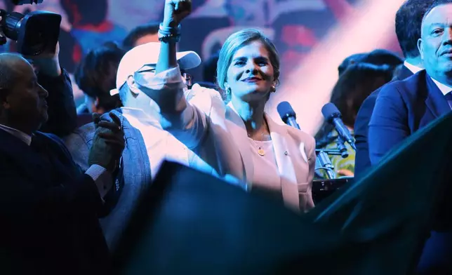 Presidential candidate Laura Fernández addresses supporters after polls closed in San Jose, Costa Rica, Sunday, Feb. 1, 2026. (AP Photo/Carlos Borbon)
